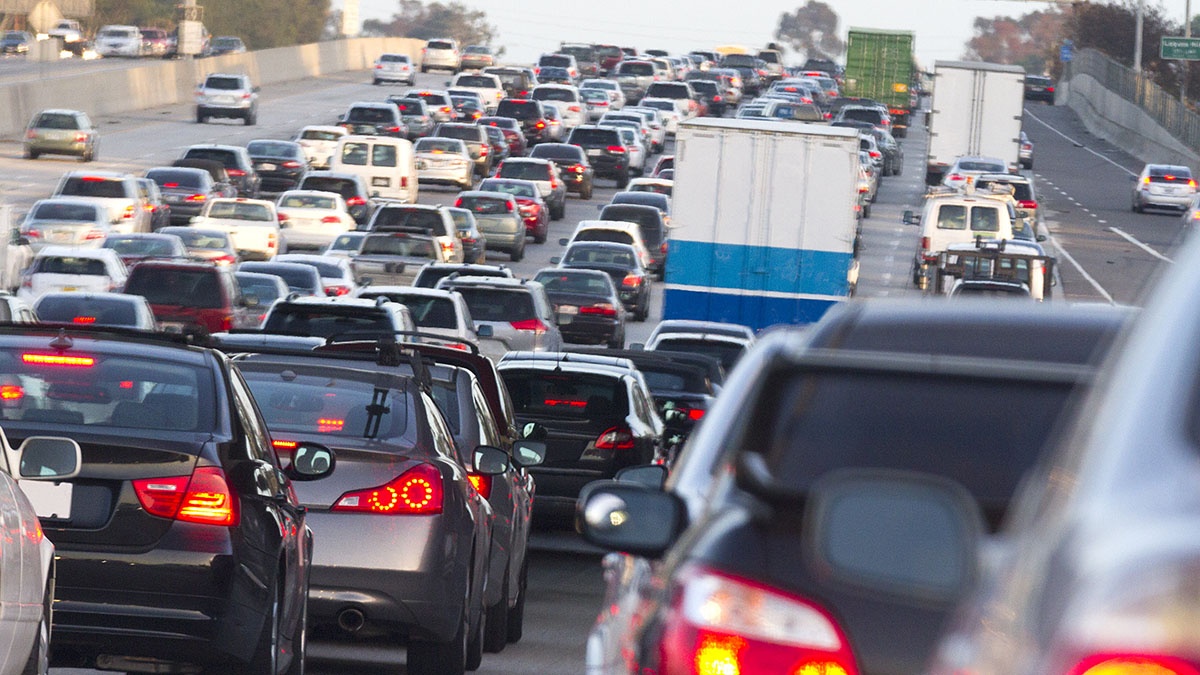 A traffic jam on a highway

Description automatically generated